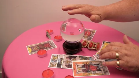 Crystal ball on table with tarot cards Stock Footage 115331699
