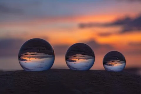 Crystal balls on Karon beach Phuket at sunset Stock-Fotos