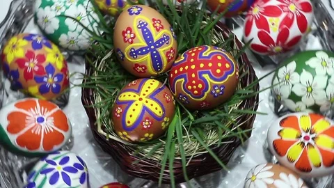 A crystal basket with Easter eggs hand-painted rotates around its axis Stock Footage 74305299