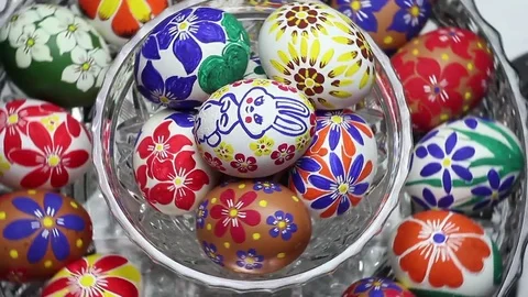 A crystal basket with Easter eggs hand-painted rotates around its axis Stock Footage 74305414