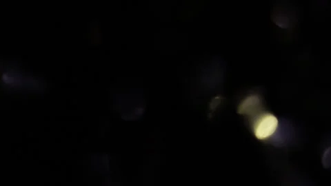 Crystal bokeh lights at very fast speed in the dark Stockbeeldmateriaal 309235418
