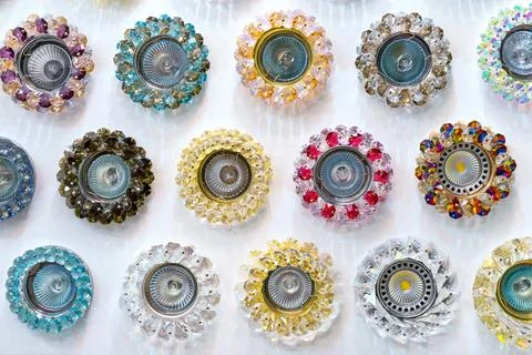 Crystal ceiling lights with halogen and LED lighting. Stock Photos