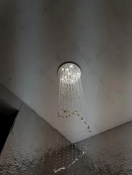 Crystal chandelier on ceiling Stock Photos