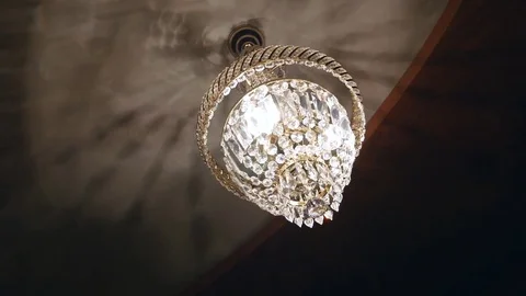 Crystal chandelier in classic room shining Stock Footage