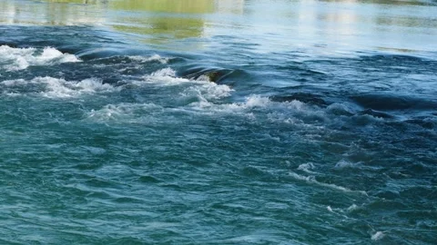 Crystal clear blue mountain river Stock Footage 239547767