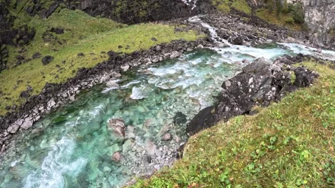Crystal Clear Blue River with Waterfall in Norway 5K Stock Footage 325562701