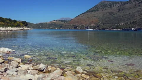 Crystal Clear Coastal Water Over Rocky Shore Stock Footage 333580725