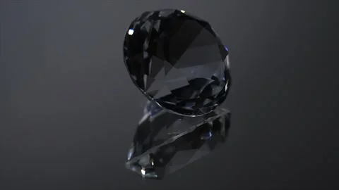 Crystal, clear Diamond rotating over black background, with reflection.  Stock Footage 318964632