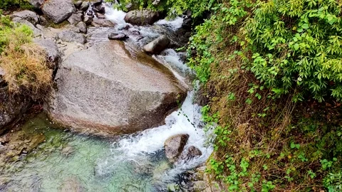 Crystal clear Green Water Cascade and big Rocks. Stock Footage 304550624
