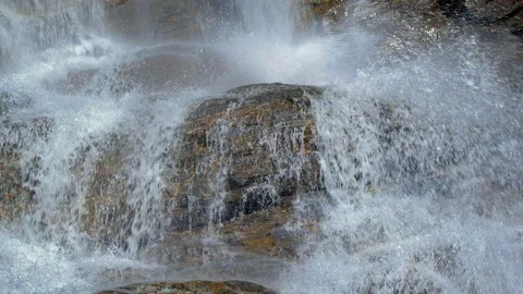 Crystal clear mountain waterfall slow motion 動画素材 112385883