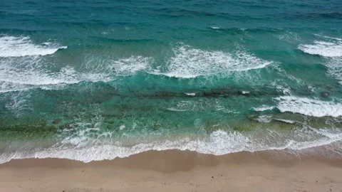 Crystal clear ocean waves on beach Stock Footage