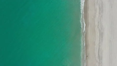 Crystal clear ocean waves on beach Stock Footage 147515202