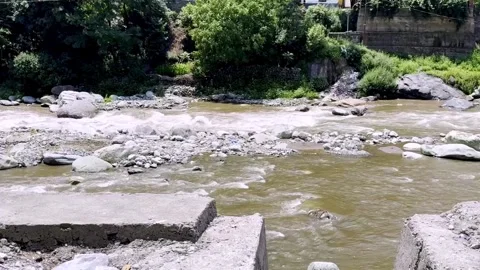 Crystal Clear River Water Flowing Through Scenic Natural Landscape 库存影片 339535220