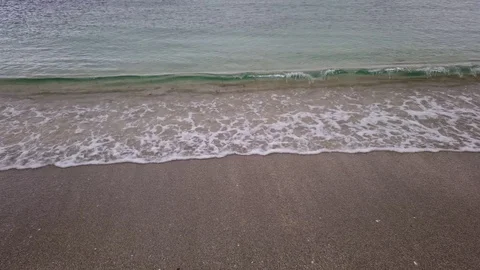 Crystal clear sea and waves with sand Stock Footage 127163209