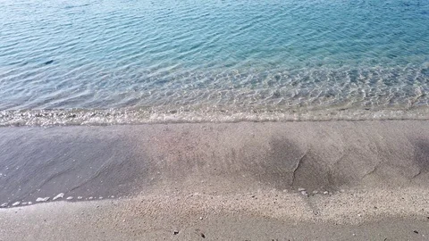 Crystal clear sea and waves with sand Stock Footage 127234924