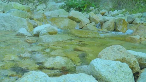Crystal Clear Stream Flowing Over Rocks | Calming Nature Sounds for Relaxation Stock Footage 286935210