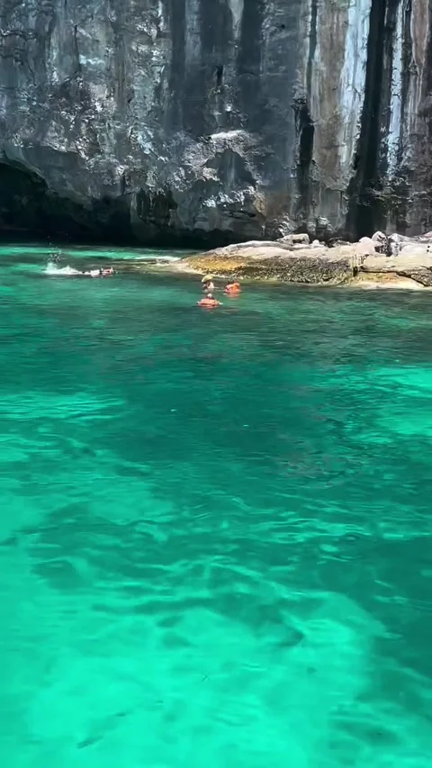 Crystal Clear Turquoise Waves on White Sand Beach at Maya Bay Stock Footage 339876660