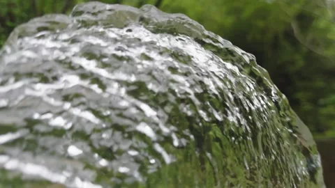 Crystal Clear Water Cascading Over Mossy Forest Rock Stock-Footage 335578802