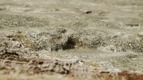 Crystal clear water flowing over rocks in super slow motion 4k Stock Footage 203975184