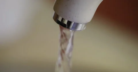 Crystal clear water flows from the tap, 4K Stock Footage 255964758