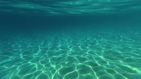 Crystal clear water gently moves beneath surface. Lagomandra, Greece Stock-Footage 339022368