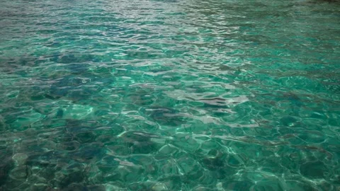 Crystal clear water light creates a beautiful veil, consisting of sunlight Stock Footage 165924974