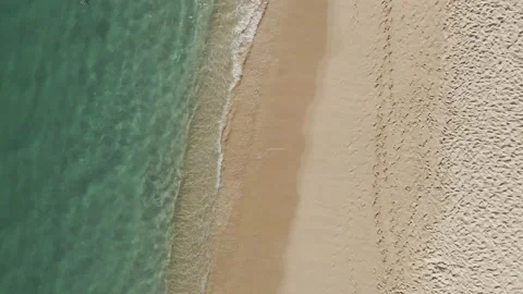 Crystal clear water on the Pacific Ocean sand shore Stock Footage 157824812
