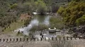 Crystal clear water with rocks and bridge landscape Mértola 4k or 4k+ Resolution