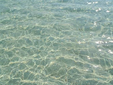 Crystal Clear Water Sunlight Patterns Stock Photos