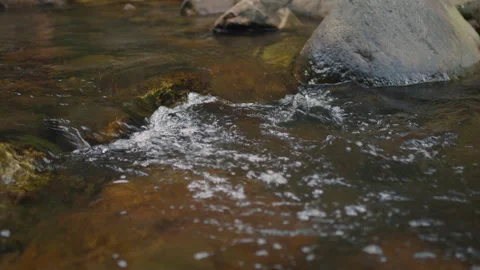 Crystal Clear Waterfall Flowing Over Rocks in Tropical Forest 스톡 동영상 312312320
