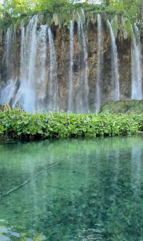 Crystal Clear Waterfall at Plitvice Lakes National Park Croatia Vertical Video Stock Footage 335242739