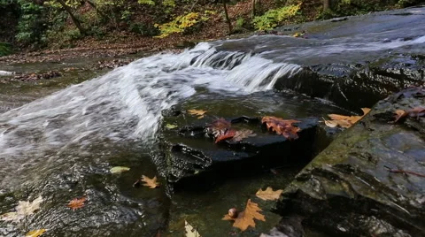 Crystal Clear WaterFlowing Down Rocks in Stoney Creek in New York State Stock Footage 45558958
