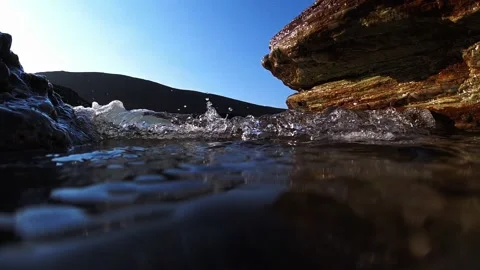 Crystal clear waves crashing into camera in beautiful slow motion Stock-Footage 221991916