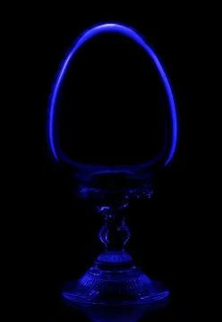 Crystal egg in darkness Stock Photos