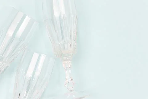 Crystal glasses on a blue background. Stock Photos