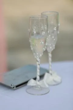Crystal glasses on the table close-up at the wedding Stock Photos