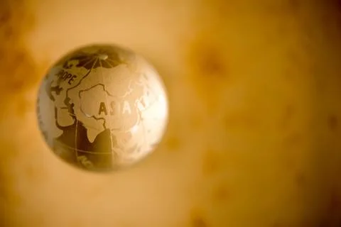 Crystal globe on old paper Foto stock