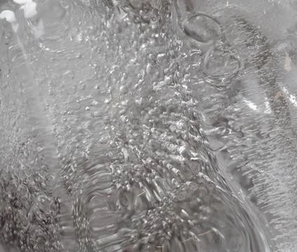 Crystal ice cubes surface. Wet, melt or freeze pattern texture. Stock Photos
