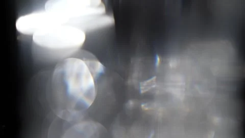 Crystal light bokeh overlapping abstractly on black background Stock Footage 315541308