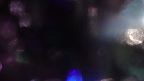 Crystal light leaks on full-screen bokeh background Vidéo 317490406