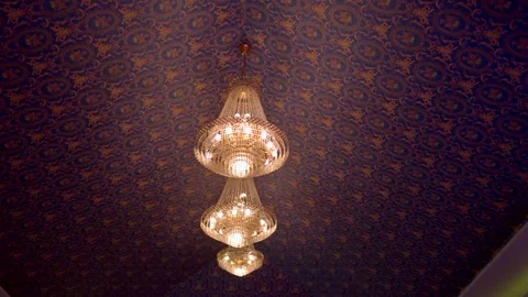 Crystal lights on curved ceiling tent hangers for party receptions. Stock Footage 313318514