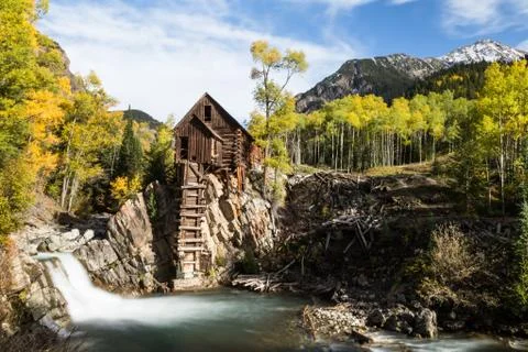 Crystal Mill with Autumn trees changing yellow Stock Photos