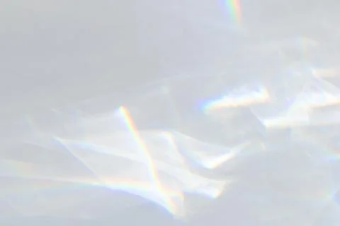Crystal prism rainbow light refraction texture on white background overlay Foto stock