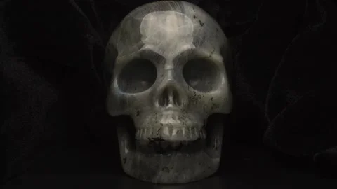 Crystal Skull of Human made of Labradorite Stone Illuminated from Left to Right 스톡 동영상 140170978