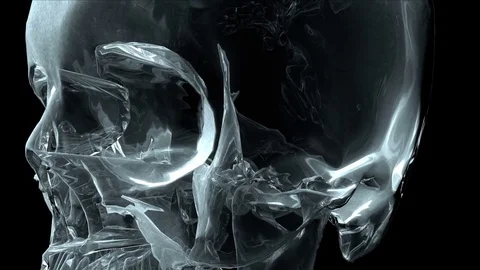 A crystal skull rotates and faces camera - Skull 001 HD Stock Video Stock Footage 71105956