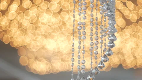 Crystal strass lamp over warm light background luxury interior design Stock Footage 101573415