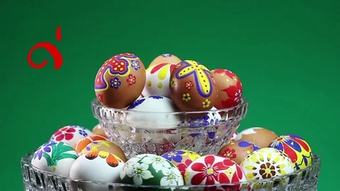 A crystal vase with Easter eggs. Appears the text "Happy Easter" Stock-Footage 74405219