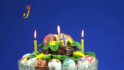 A crystal vase with Easter eggs revolves and appears the text "Happy Easter" 動画素材 74405202