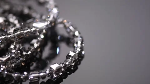 Crystals bracelet or necklace border jewels, gems, diamonds over black Vídeo Stock 346601903
