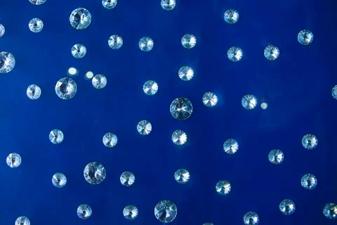 Crystals on mottled blue background Stock Photos